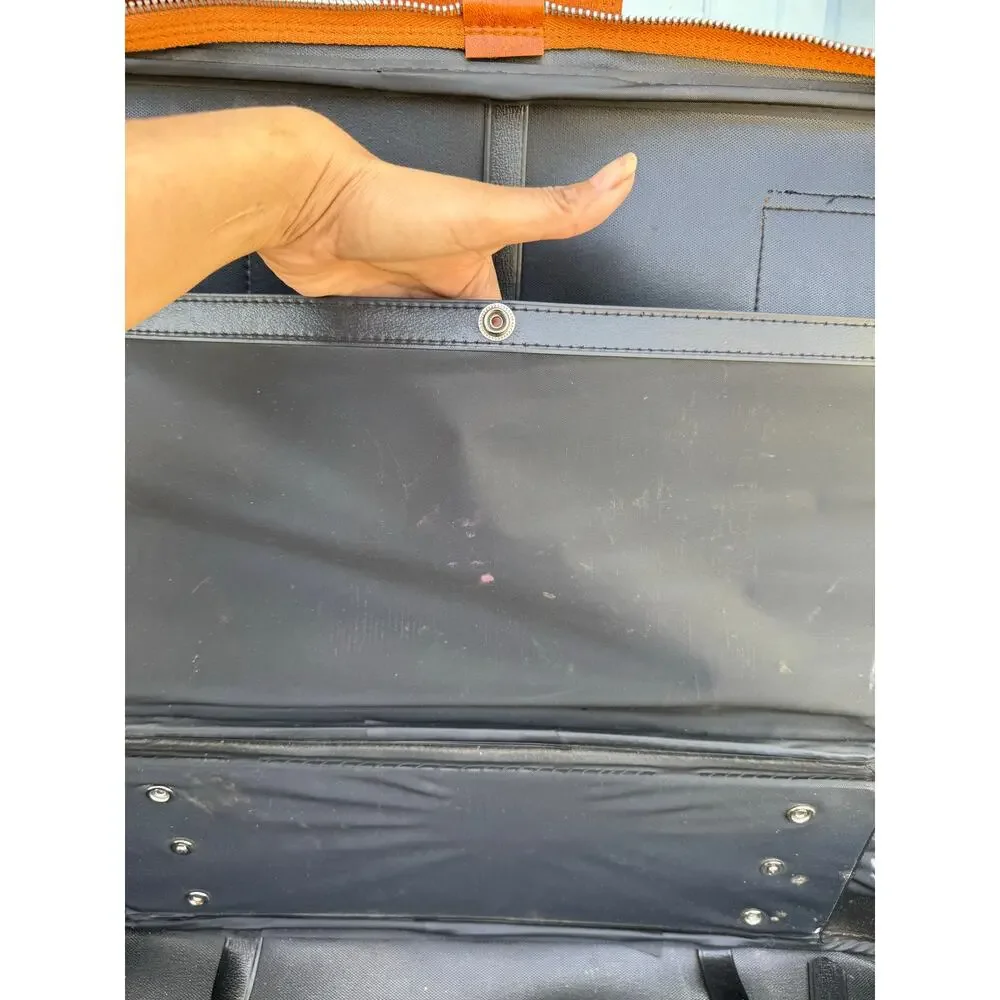 vintage 1970s tan faux-leather carry on suitcase luggage 70s jet set masculine